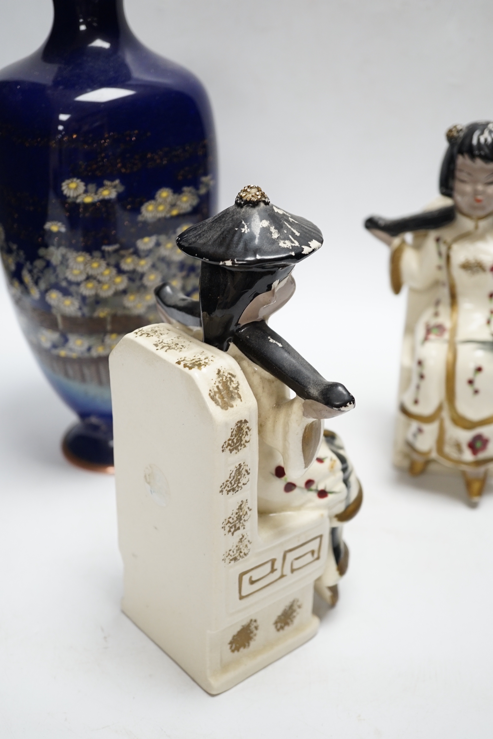 A pair of Japanese earthenware bookends and a Japanese cloisonné enamel vase, decorated in the musen and silver wire technique, vase 30cm